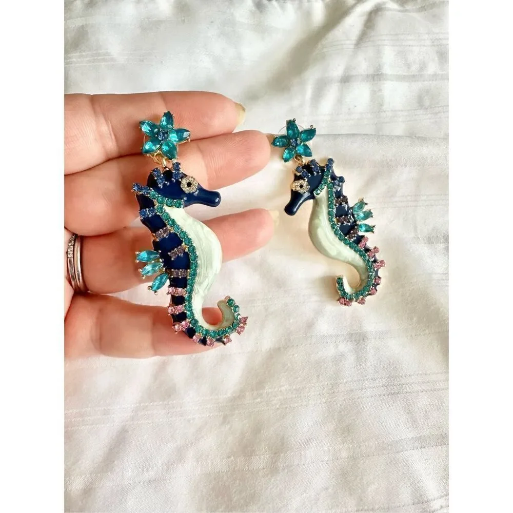 Navy blue and rhinestone seahorse dangle earrings ￼